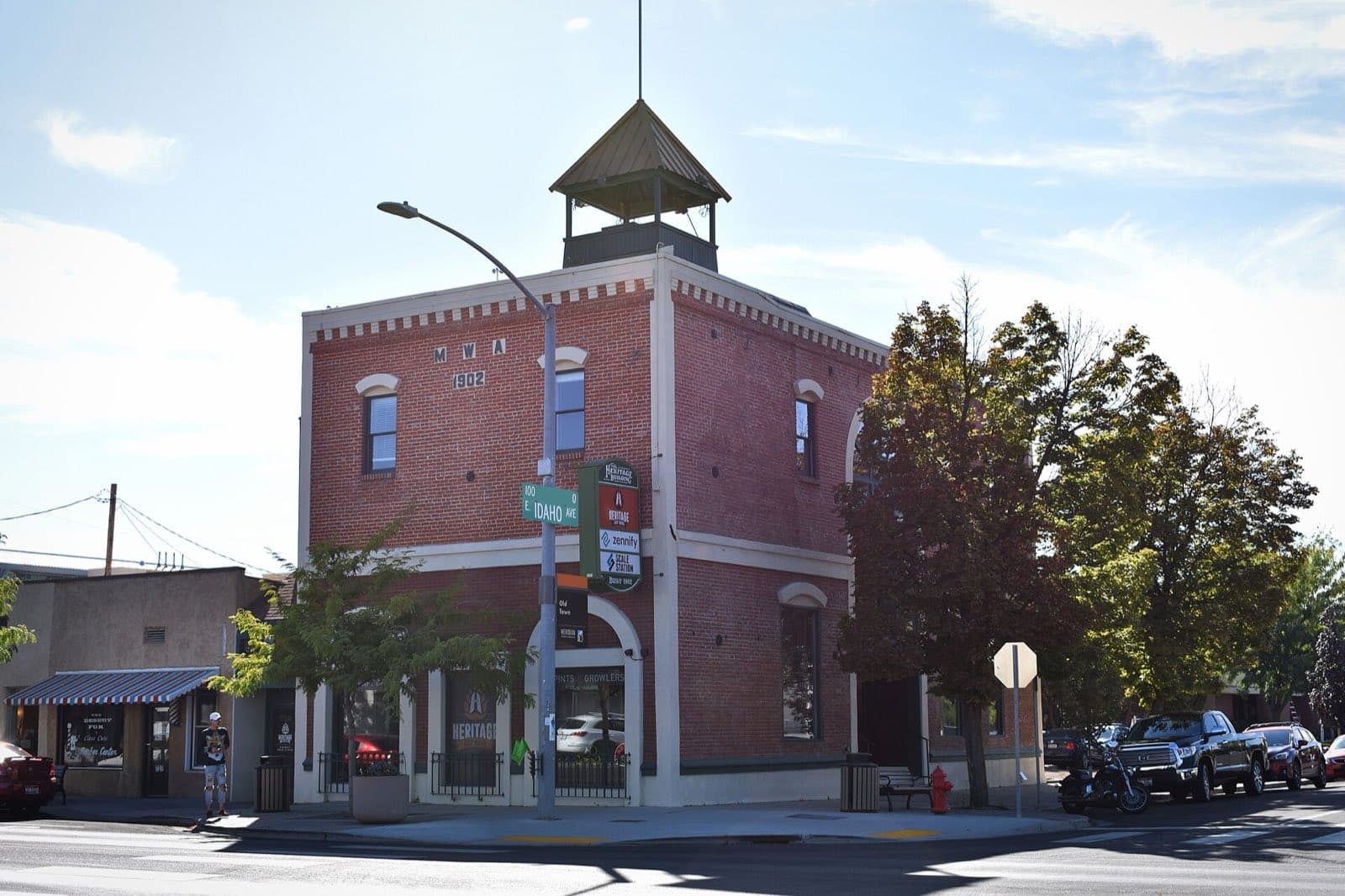 The historic brick Heritage Building with its bell tower in downtown Meridian.